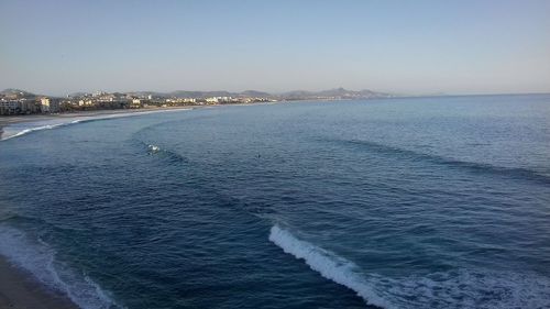 Scenic view of sea against clear sky