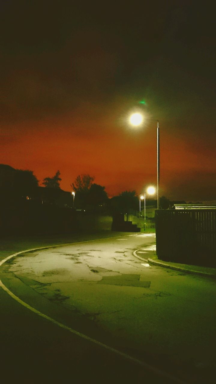 VIEW OF ROAD AT SUNSET