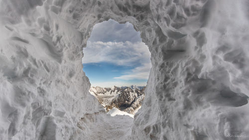 Snow capped mountain against sky