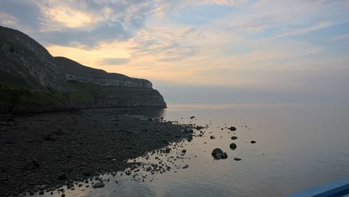 Scenic view of sea at sunset