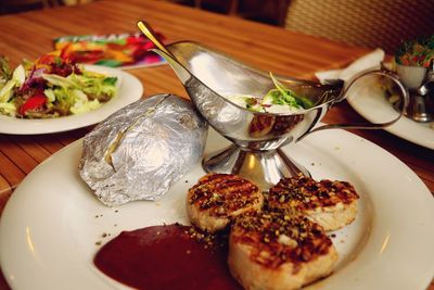 Close-up of food served in plate on table