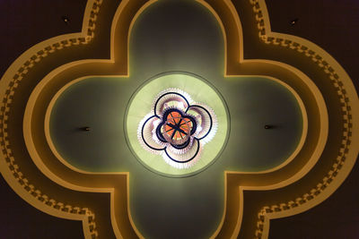 Low angle view of illuminated ceiling