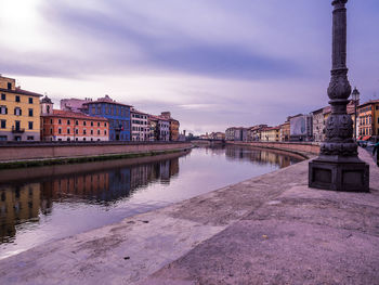 Bridge over river in city. pisa, italy