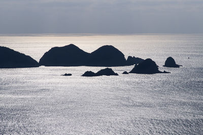 Scenic view of sea shore against sky