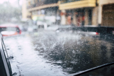 Full frame shot of wet car window