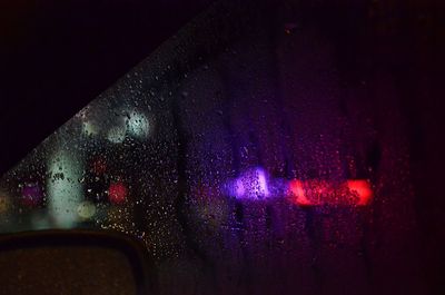 Close-up of wet car window