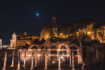 Illuminated cathedral against sky at night