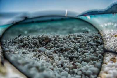 Close-up of pebbles on beach