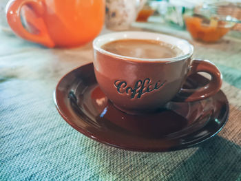 Close-up of tea cup on table