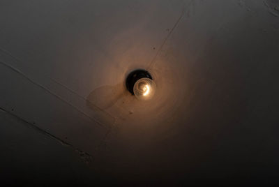 Low angle view of illuminated ceiling