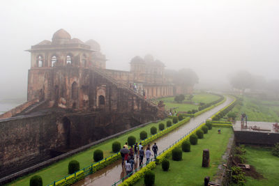 Tourists in front of historical building