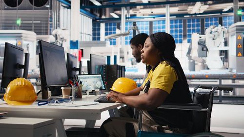 Side view of man working at restaurant