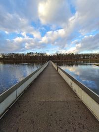 Surface level of pier against sky