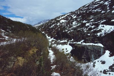 Scenic view of mountains against sky during winter