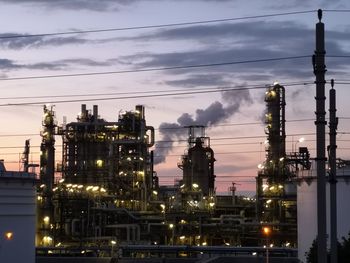 Illuminated oil refinery at night