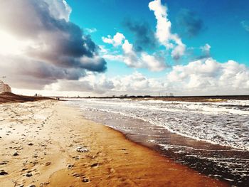 Scenic view of beach against sky