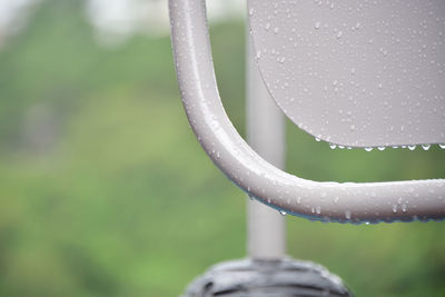 Close-up of water drops on metal