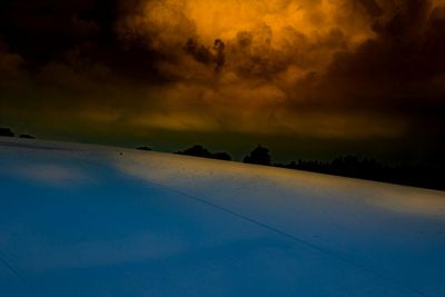 Scenic view of cloudy sky at dusk