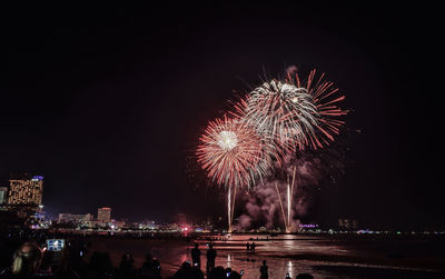 Firework display at night