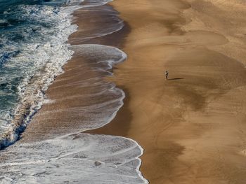 Scenic view of sand dune on beach