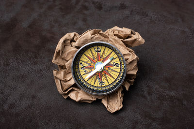 Close-up of clock on table