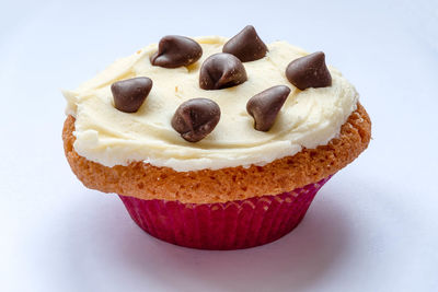 Close-up of cupcakes against white background