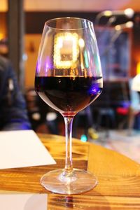 Close-up of wine glass on table in restaurant