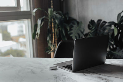 Close-up of laptop at home