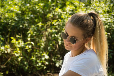 Close-up of girl wearing sunglasses