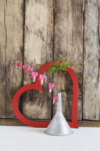 Close-up of flower vase on table