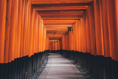 Empty footpath at torii gate