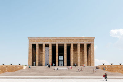 Tourists at a building