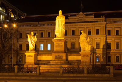 Low angle view of illuminated building at night