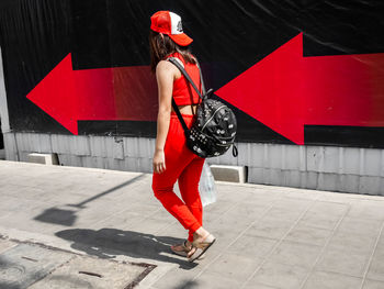 Woman with red umbrella