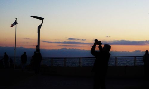 Scenic view of sea at sunset