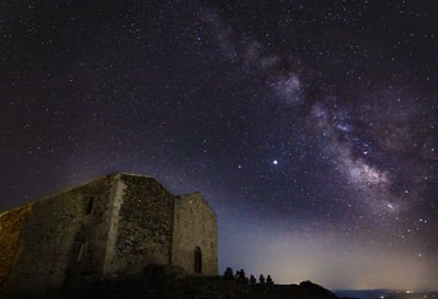 Low angle view of star field against sky at night