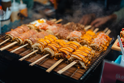 Close-up of meat on barbecue grill