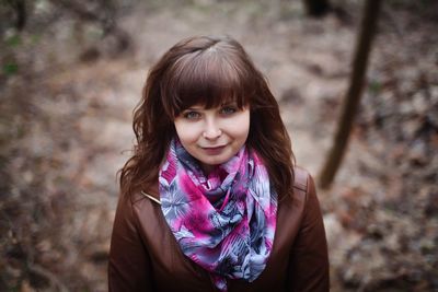 Portrait of smiling girl standing during autumn