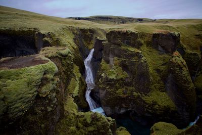 High angle view of river amidst rock formations