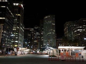 Modern buildings in city at night