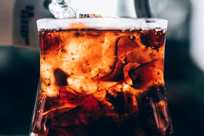 Close-up of beer glass on table