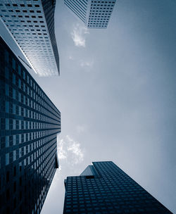 Low angle view of skyscraper against sky