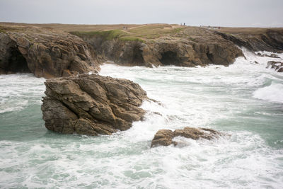 Waves splashing on rocks