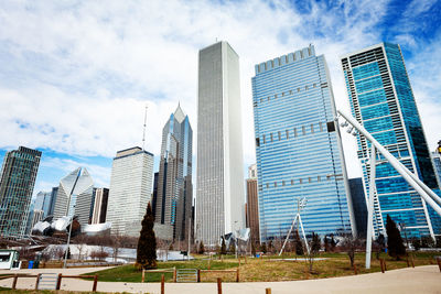 Low angle view of modern buildings against sky