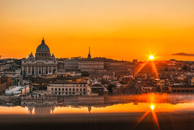 View of buildings against sky during sunset