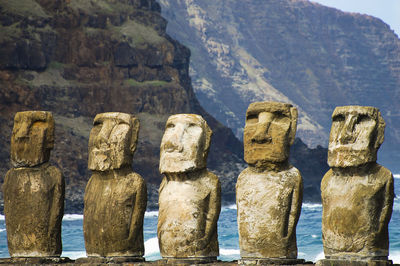 Close-up of statue against mountain