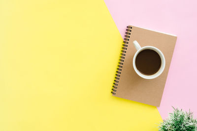 High angle view of coffee cup on table