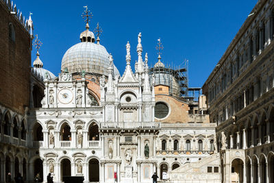 Low angle view of cathedral against blue sky