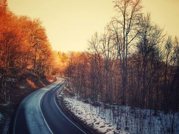 Road against sky during sunset