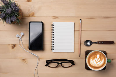 High angle view of coffee cup on table